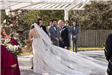 Father Walks Bride up to Groom Under Pergola