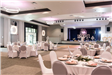 Several Table Set up Spread Throughout the Grand Ballroom